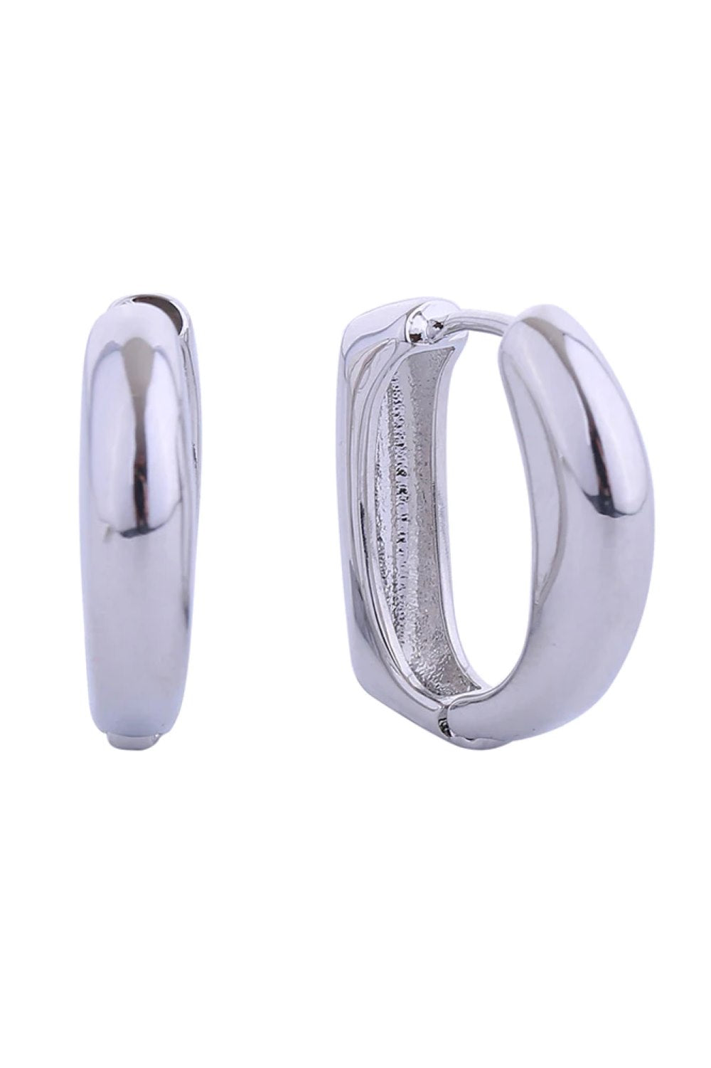 White Gold Elegant 14K puff curve huggie hoop earrings designed for everyday wear and special occasions. Crafted from hypoallergenic brass, these earrings are gentle on sensitive skin and lead and nickel compliant for peace of mind. The curved huggie style hugs the earlobe beautifully with a subtle puffed texture that catches the light. Measuring 1.8cm in diameter, they offer the perfect balance of presence and comfort. A timeless addition to any jewelry collection.
