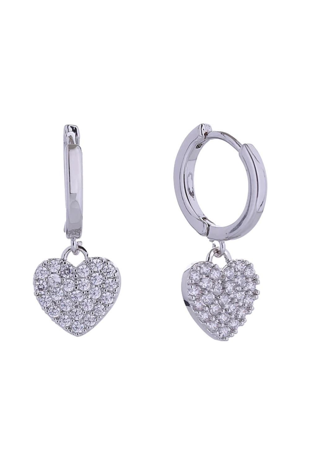 White Gold Elegant 14K gold and white gold dipped swing earrings featuring radiant heart charms that catch the light beautifully. Crafted from hypoallergenic brass with sparkling cubic zirconia accents, these delicate 1.7cm earrings are perfect for everyday wear or special occasions. Lead and nickel compliant for sensitive skin. Expertly made in Korea with attention to quality and design. A timeless piece that adds sophistication to any jewelry collection.
