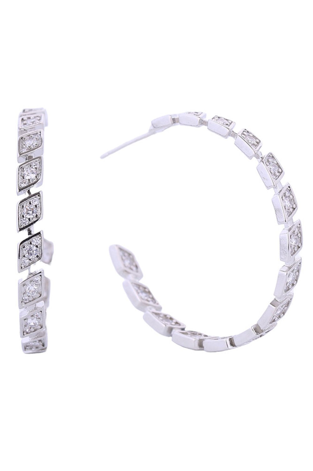 White Gold Elevate your everyday elegance with these stunning 14K Gold and White Gold dipped Rhombus Eternity Hoop Earrings. Crafted with precision in Korea, these 4cm hoops feature shimmering cubic zirconia stones set in a timeless rhombus pattern that catches light beautifully from every angle. Perfect for both casual days and special occasions, these versatile hoops add instant sophistication to any outfit.