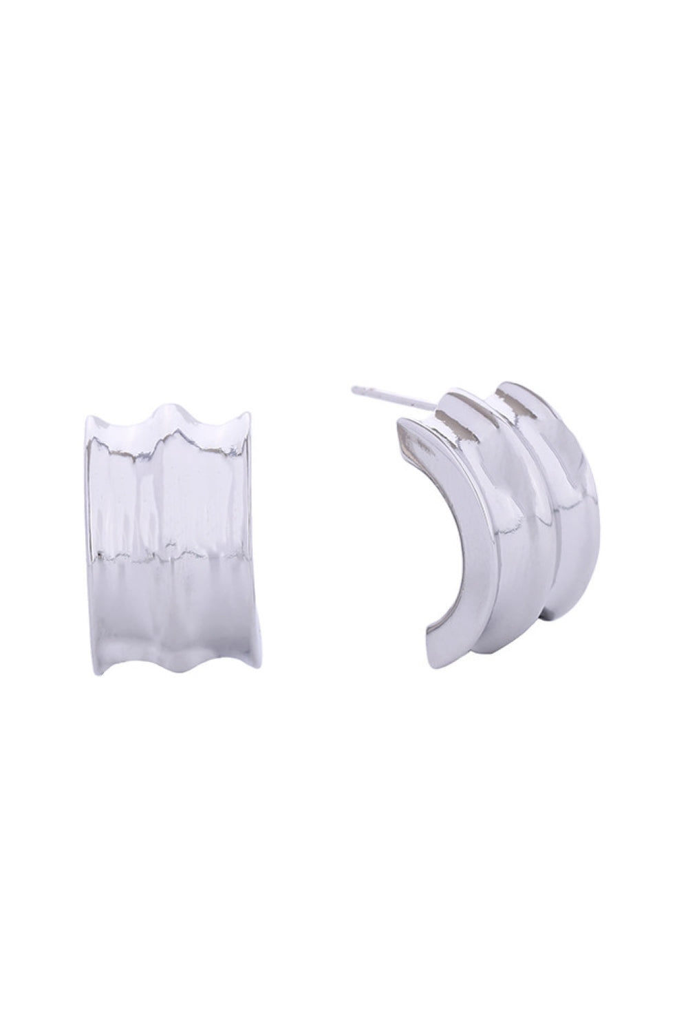 White Gold Elevate your everyday look with these striking 14K Gold and White Gold dipped sculpture earrings. Crafted from hypoallergenic brass, they're gentle on sensitive skin while delivering bold, modern style. Each earring measures 2.5cm, offering the perfect balance of presence and wearability. Lead and nickel compliant for peace of mind. Expertly made in Korea, these post earrings combine artistic design with quality craftsmanship.