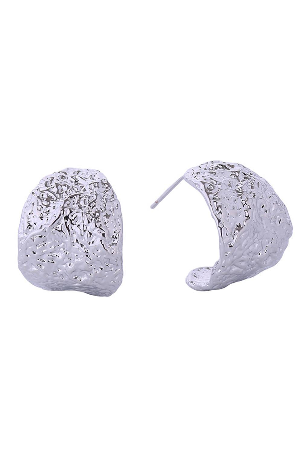 White Gold Elegant textured hoop post earrings crafted in brass with 14K gold and white gold dipping. These hypoallergenic studs measure 2.1cm and are designed for sensitive ears. Lead and nickel compliant for safe, everyday wear. Expertly made in Korea, they combine timeless style with quality craftsmanship.