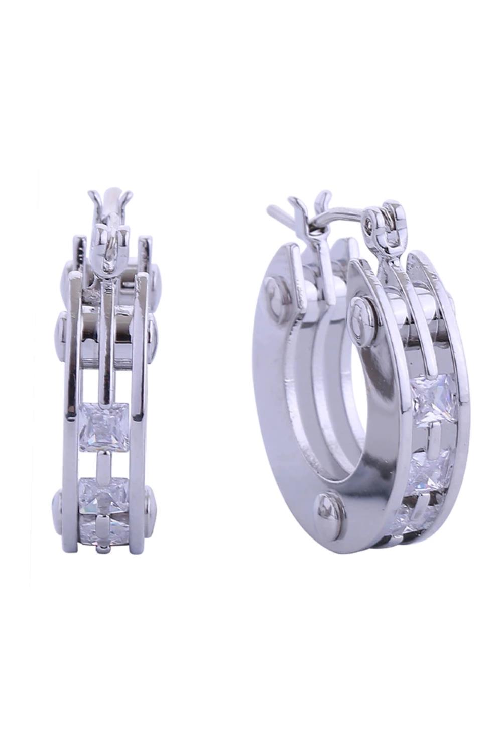 White Gold Elevate your everyday look with these stunning 14K Trio Layer Hoop Pincatch Earrings. Featuring a sophisticated three-layer design, these hoops measure 2.6cm in diameter for a refined, versatile size that works for any occasion. Crafted from hypoallergenic brass with sparkling cubic zirconia accents, these earrings deliver luxury appeal without the luxury price tag. The secure pincatch closure ensures they stay in place throughout your day.