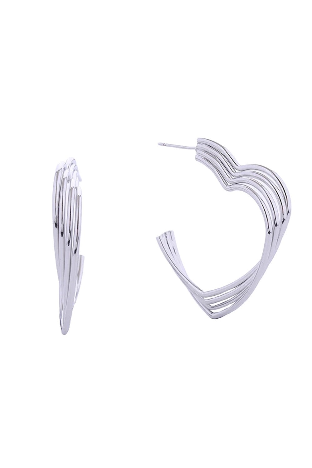 White Gold Elegant triple open heart post earrings crafted in brass with 14K gold and white gold dipping. Each earring measures 4cm, featuring a delicate stacked heart design that catches light beautifully. Hypoallergenic construction ensures comfortable all-day wear. Lead and nickel compliant for safety and peace of mind. Expertly made in Korea, these timeless pieces add a touch of romance to any look.