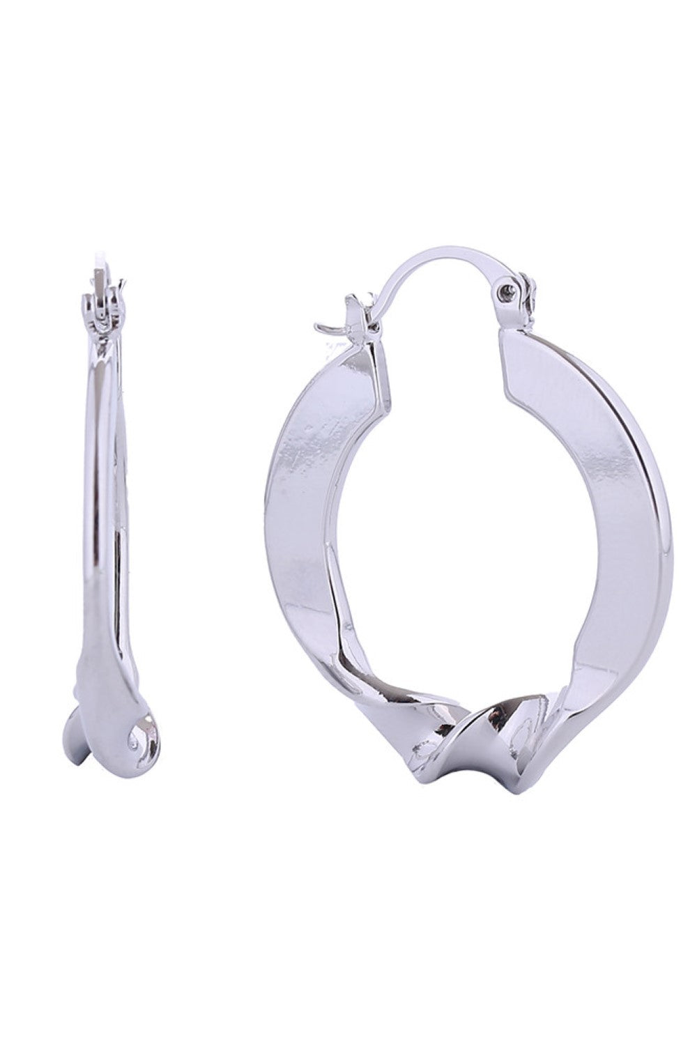 White Gold Elevate your everyday look with these stunning 14K Gold/White Gold Dipped Twist N Shine Hoop Earrings. Crafted from hypoallergenic brass, these beautifully twisted hoops are perfect for sensitive skin. At 2.8cm, they offer the ideal balance of presence and wearability. Lead and nickel compliant for peace of mind. Expertly made in Korea with attention to detail that shows.