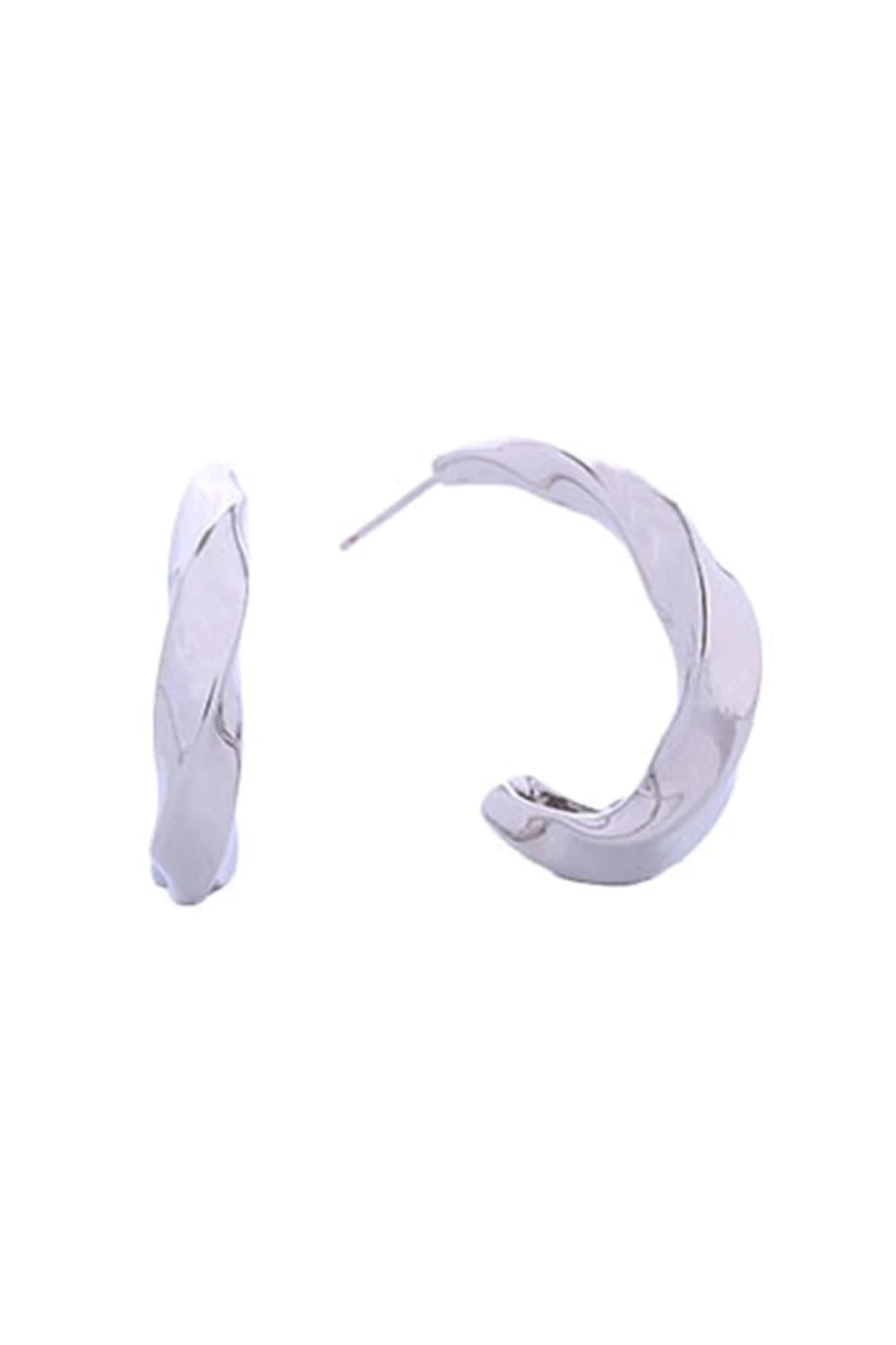 White Gold Elevate your everyday look with these stunning 14K Gold/White Gold Dipped Twisted Hoop Post Earrings. Crafted from hypoallergenic brass, these beautifully twisted hoops measure 2.5cm in diameter the perfect size for versatile styling. Designed with sensitive skin in mind, they're lead and nickel compliant, ensuring comfort all day long. 