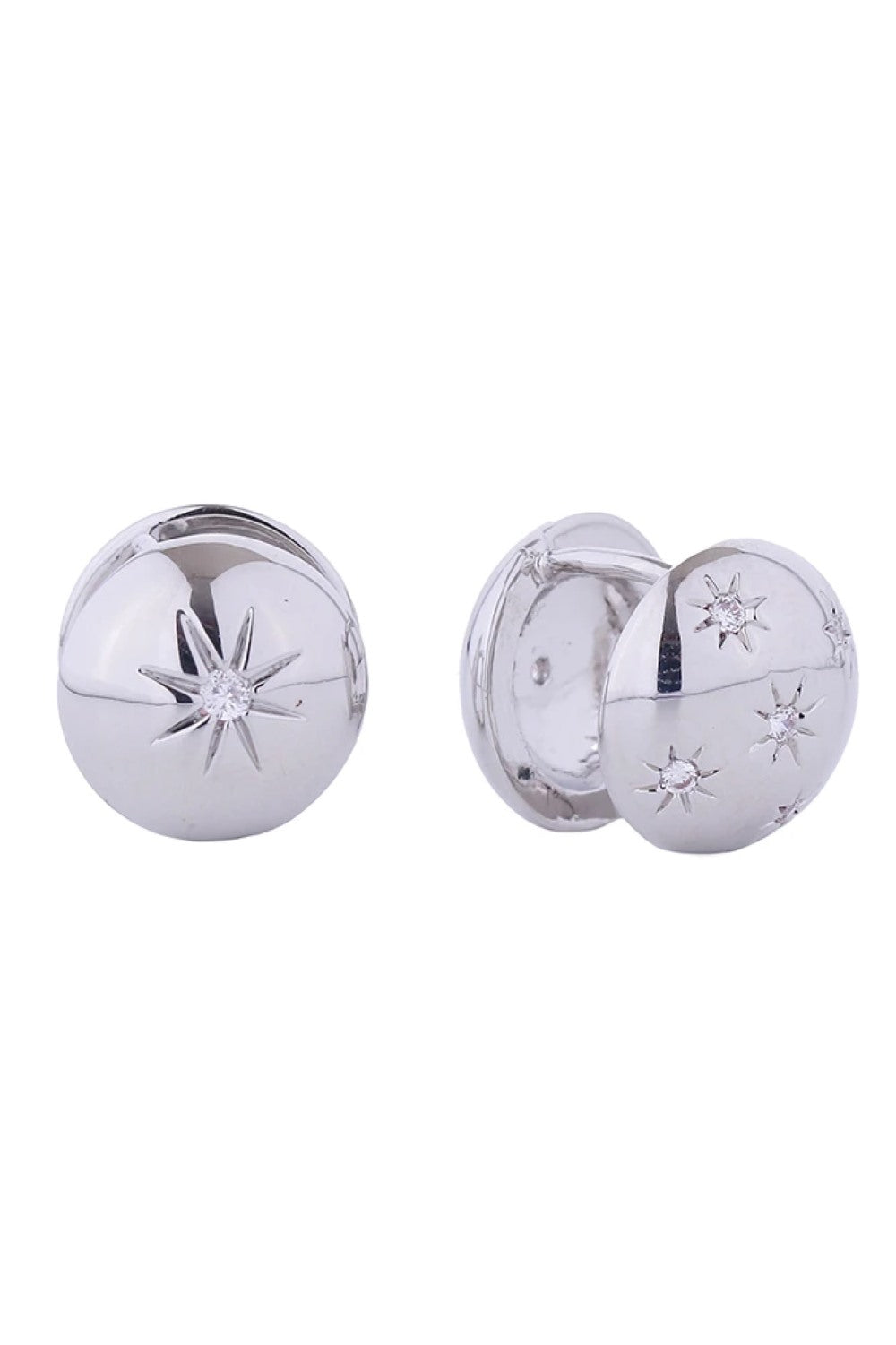 White Gold Elegant Victorian-inspired star huggie earrings crafted in brass with 14K gold and white gold dipping. Featuring sparkling cubic zirconia stones, these petite 1cm diameter earrings offer timeless charm with a modern twist. Hypoallergenic design is lead and nickel compliant for sensitive skin. Expertly made in Korea, they're the perfect everyday luxury piece.