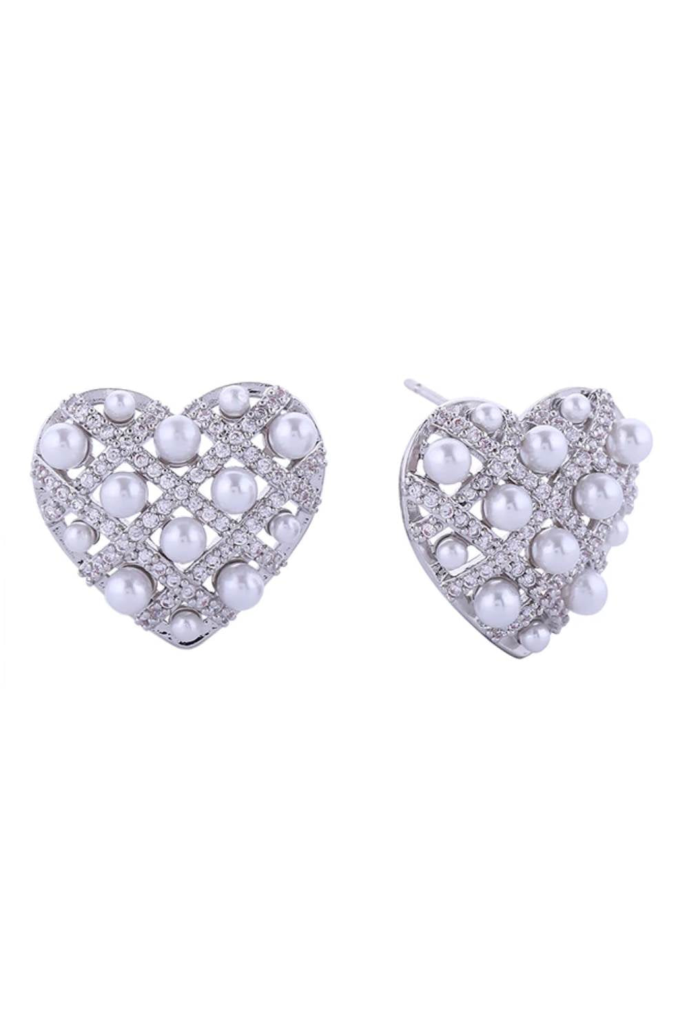 White Gold Elegant heart-shaped post earrings featuring a delicate woven design with cubic zirconia and pearl accents. Crafted from hypoallergenic brass with 14K gold and white gold dipping for a luxurious finish. Each earring measures 1.8cm in diameter, perfect for everyday wear or special occasions. Lead and nickel compliant for sensitive skin. Expertly made in Korea.