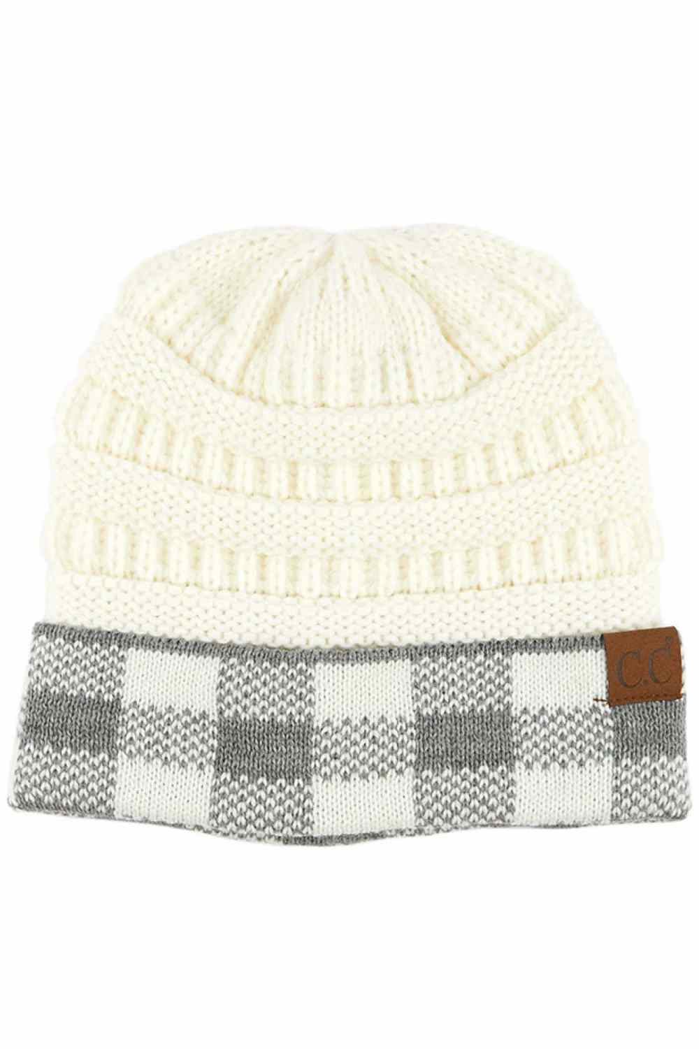 White grey Upgrade your cold-weather style with the C.C Buffalo Check Cuff Knit Beanie. This classic beanie features a distinctive buffalo check pattern cuff that brings timeless appeal to any winter look.