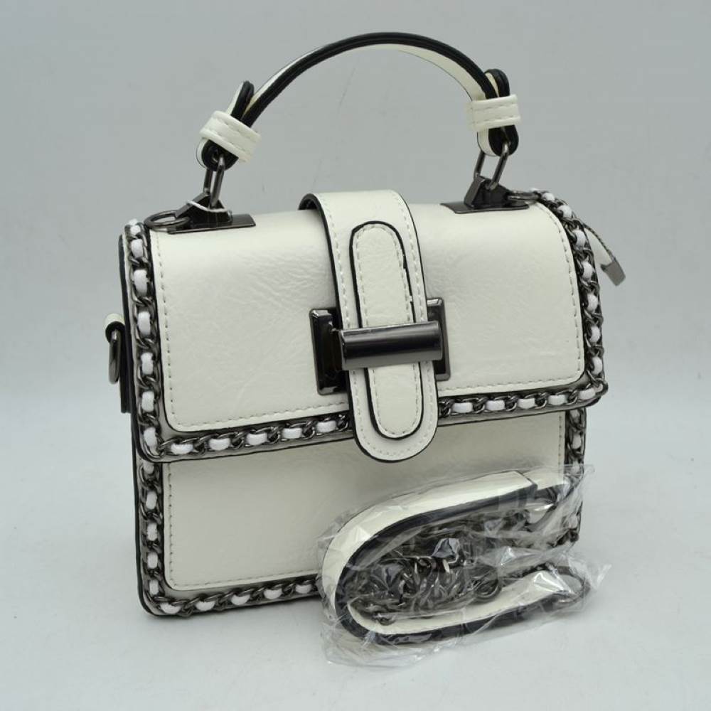 White Add a touch of structured elegance to your look with this chic top-handle satchel bag. Designed for the modern trendsetter, it seamlessly blends classic vintage vibes with contemporary edgy accents.