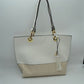 White Kelli 2n1 Vegan Tote Handbag Pouch Faux Leather Tote Bag Inside Crossbody Pouch, Best Seller Tote, Handbag has plenty of room to fit all your items, available in a few colors. Handbag also comes with a removable insert bag that doubles as lining to the bag, or can be removed and worn as a crossbody bag.&nbsp;This 2 in 1 tote bag is just what the boss lady needs.