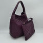 Wine This stylish everyday hobo bag features an all-over classic basket weave design and a slouchy silhouette. It is crafted with a seamless, integrated wide top handle that transitions directly into the main storage compartment for comfortable hand or shoulder carrying.