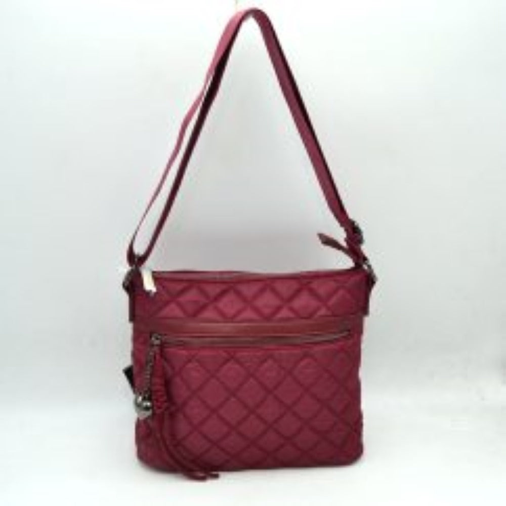 Wine This casual crossbody bag features a classic quilted diamond pattern and a slim, flexible profile tailored for everyday use. It provides functional storage compartments, including a secure top zipper closure for the main area and a prominent horizontal zippered front pocket for easy access to smaller essentials. A decorative heart-shaped metallic charm paired with a knotted fabric accent extends from the front zipper pull