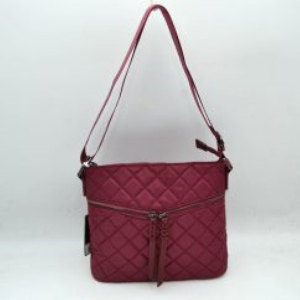 Wine This casual crossbody bag features a classic diamond quilted design and a slim, flexible profile tailored for everyday use. It offers multiple functional storage compartments, including a main upper zippered area and a distinct, gently curved horizontal front pocket equipped with dual center-closing zipper pulls that feature long, matching fringe extensions. A long, integrated adjustable shoulder strap ensures comfortable carrying over the shoulder or across the body.