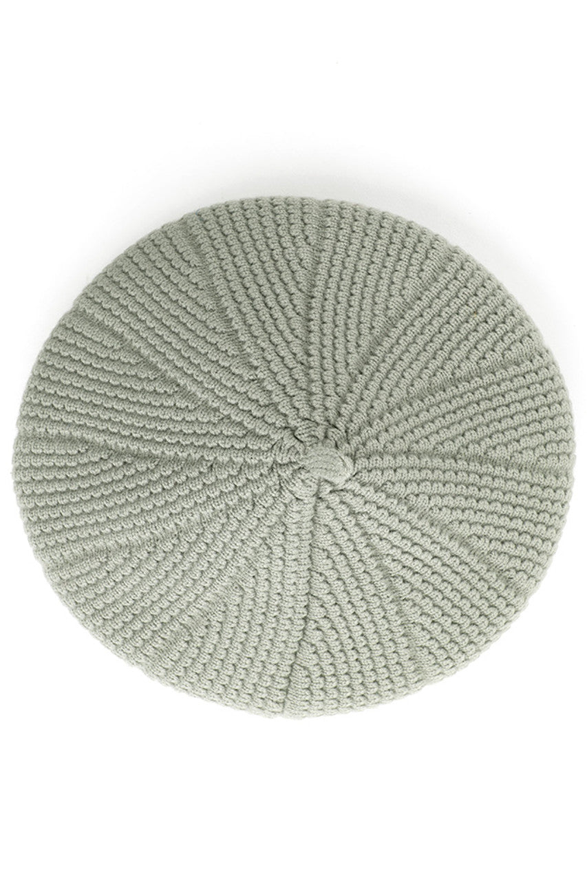 Winter Mint C.C. Scalloped Wave Pattern Beret features distinctive wave texturing for dimensional appeal. Precision-knit with premium materials for optimal comfort and durability. The classic beret silhouette with contemporary scalloped detailing offers versatile styling options for both casual and elevated looks.
