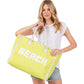 yellow BEACH Message Embroidered Fringe Tote Bag / Beach Bag is perfect for any beach day. With its spacious interior and stylish embroidered fringe detailing, it's both functional and fashionable. Carry all your beach essentials in one convenient and trendy tote. 