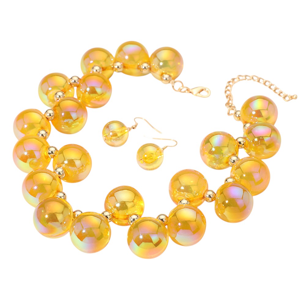 Yellow chunky iridescent ball beaded necklace elevates any outfit with its unique and eye-catching design. The perfectly placed beads create a glamorous and statement-making accessory. Crafted with quality materials, this necklace is a must-have for any fashion enthusiast. 