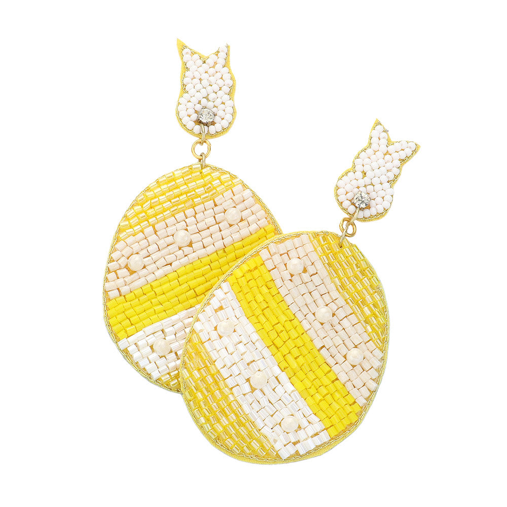 Yellow Felt Back Beaded Easter Bunny Egg Link Dangle Earrings are a festive addition to any Easter outfit. The unique design features a felt backing and delicate beaded details, providing a touch of whimsy and charm. These earrings are perfect for adding a fun and playful touch to your holiday look. 