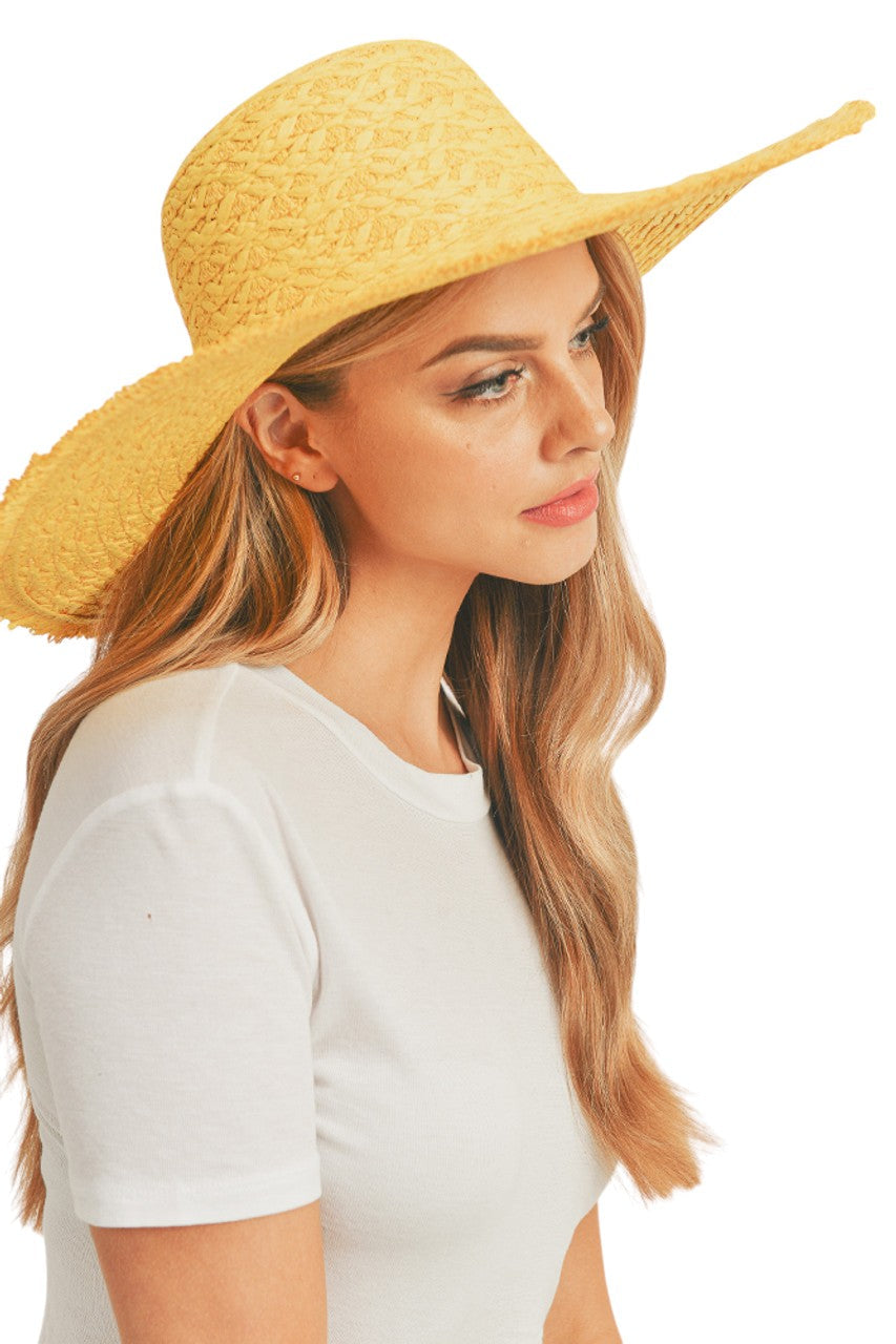 Yellow Solid Floppy Sun Hat provides superior UV protection while maintaining a timeless silhouette. Constructed with durable materials that retain shape throughout wear, it features an adjustable interior band for a secure fit across head sizes. The lightweight design ensures comfort during extended outdoor activities, making it an essential accessory for both sun protection and refined style.