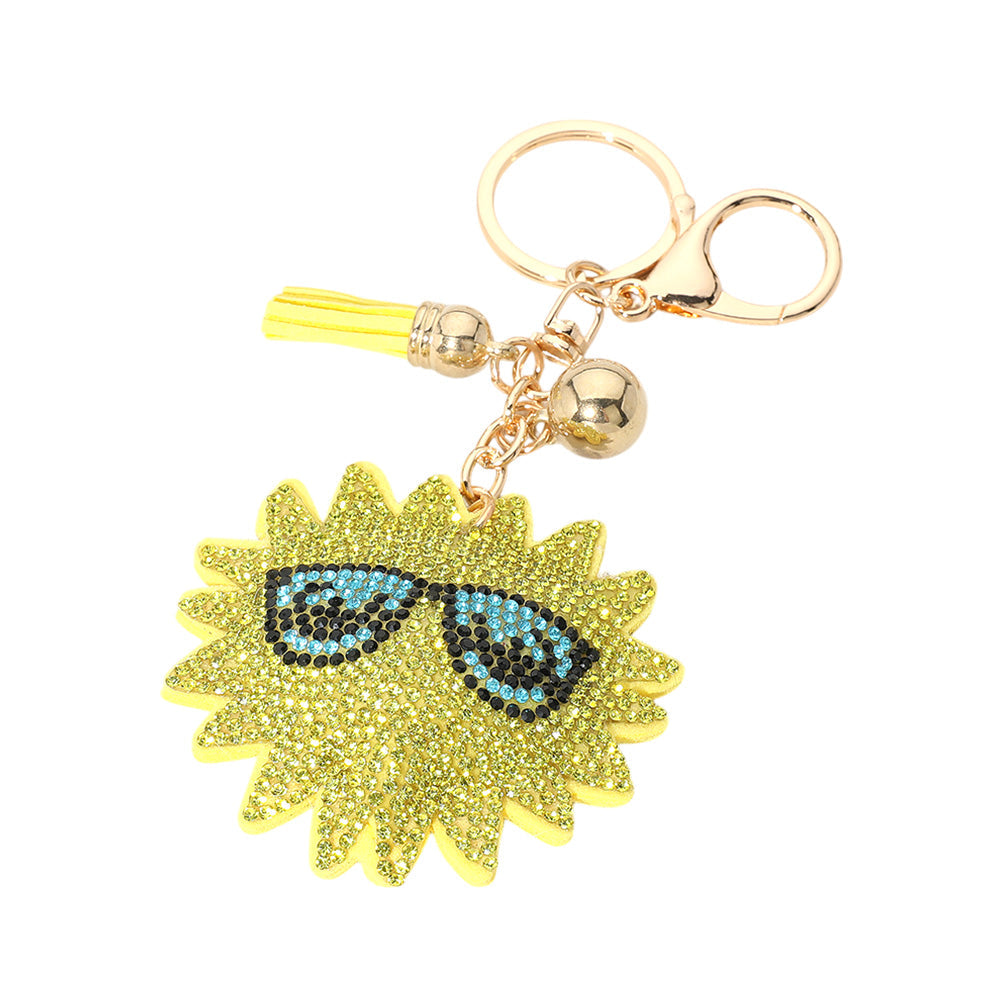 Yellow Bling Studded Sunglasses on a Sunburst Tassel Keychain are the perfect accessory for any fashion-forward individual. With their stylish design and intricate studded details, these sunglasses will make you stand out from the crowd. The sunburst tassel keychain adds a unique touch to this already eye-catching product. Stay on trend and make a statement with these sunglasses and keychain combo. 