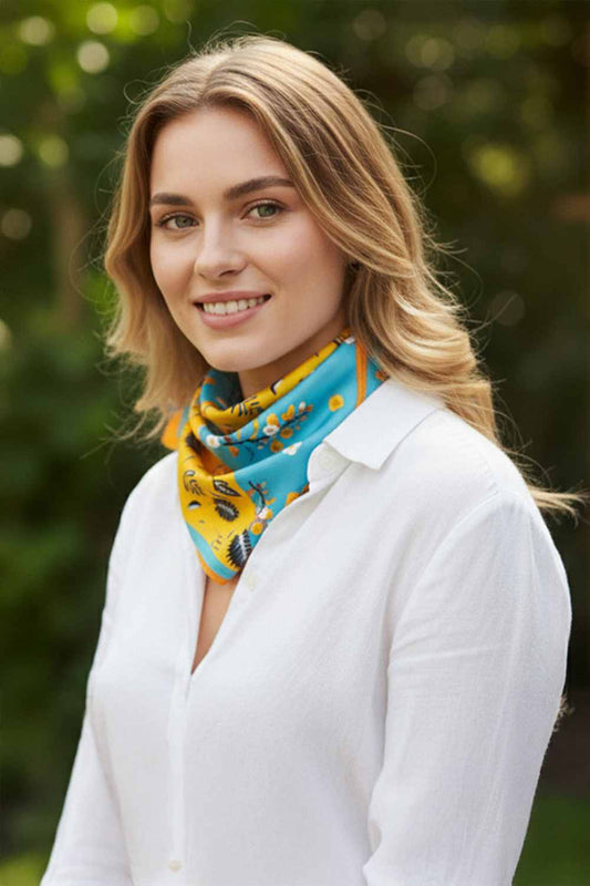 Yellow Elevate your accessory game with this versatile Dual Tone Floral Print Bandana Scarf. Crafted from 100% polyester, this lightweight, silky fabric drapes beautifully and feels luxurious against your skin. The stunning dual-tone floral design adds a pop of color and elegance to any outfit, making it perfect for all seasons. At 27.5" x 27.5", it's the ideal size for styling as a headscarf, neck wrap, or hair accessory. Whether you're dressing up for a special occasion or adding flair to your everyday lo