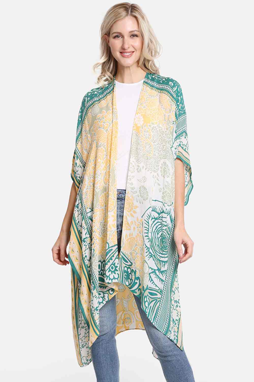 Yellow Effortless summer style meets comfort in this floral pattern print cover up. Crafted from 100% viscose, the lightweight fabric drapes beautifully while keeping you cool and comfortable. Perfect for layering over swimwear or pairing with casual outfits, this versatile piece features a relaxed kimono silhouette. Generous dimensions of 38" x 39" provide easy coverage and movement. An essential addition to your warm-weather wardrobe.