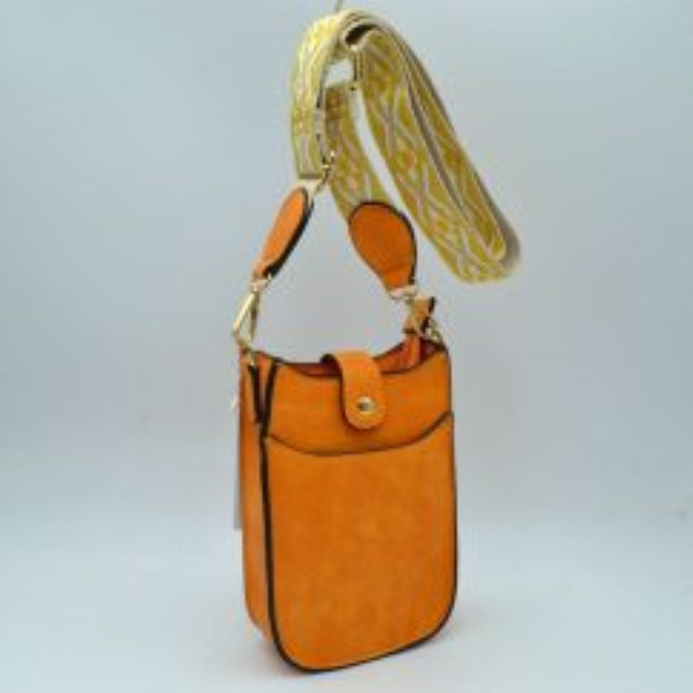 Yellow This compact crossbody bag features a lightly textured finish and a slim, vertical pouch silhouette designed for convenient everyday use. It includes dedicated storage compartments, consisting of an easily accessible open front slip pocket and a main top compartment secured by a small fold-over tab with a gold-tone snap closure.