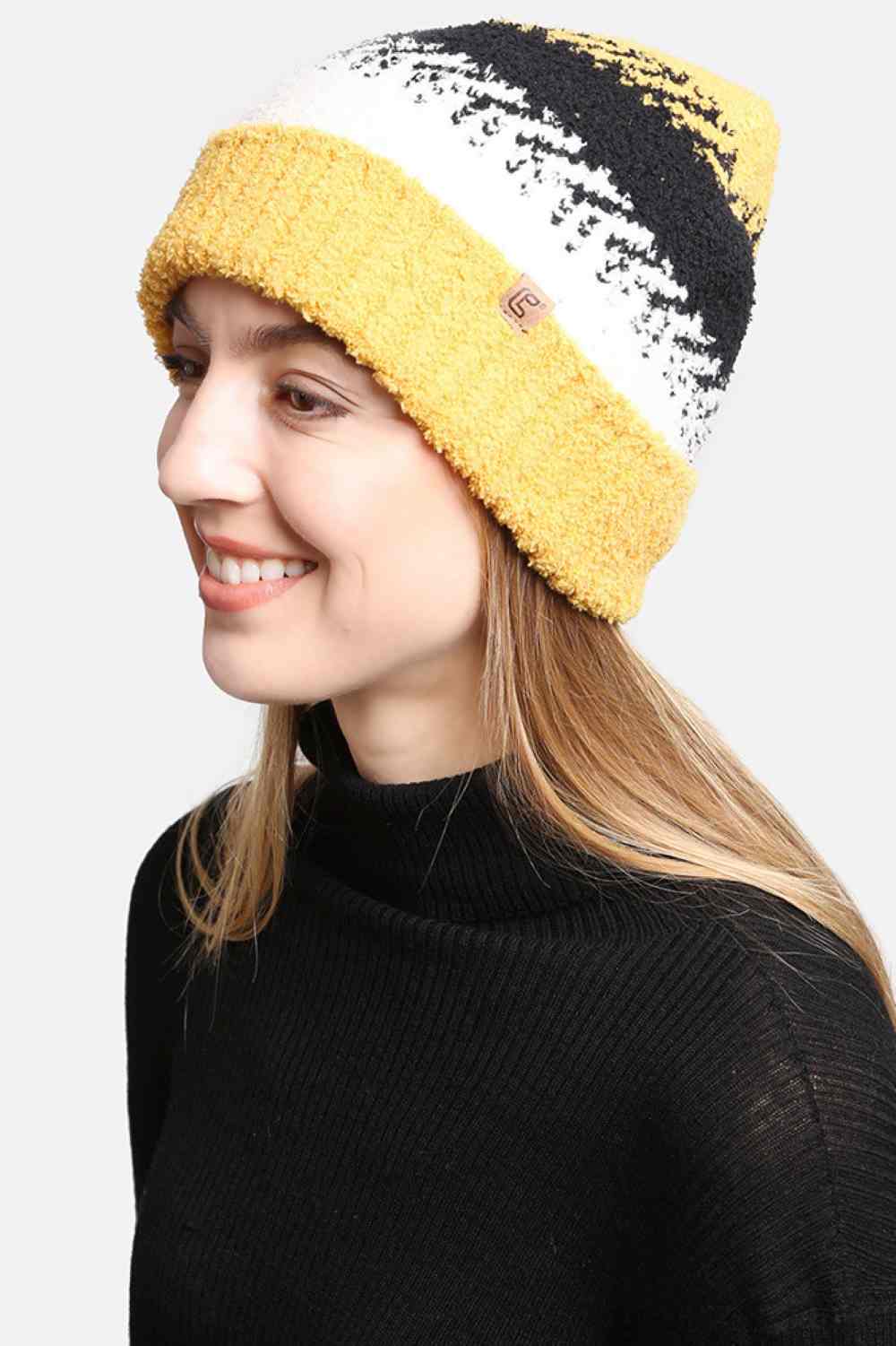 Yellow The Mixed Knit Beanie features a textured blend of knit patterns that adds depth and style to your cold-weather look. Crafted from soft, stretchy fabric, it offers a comfortable fit and reliable warmth for everyday winter wear.