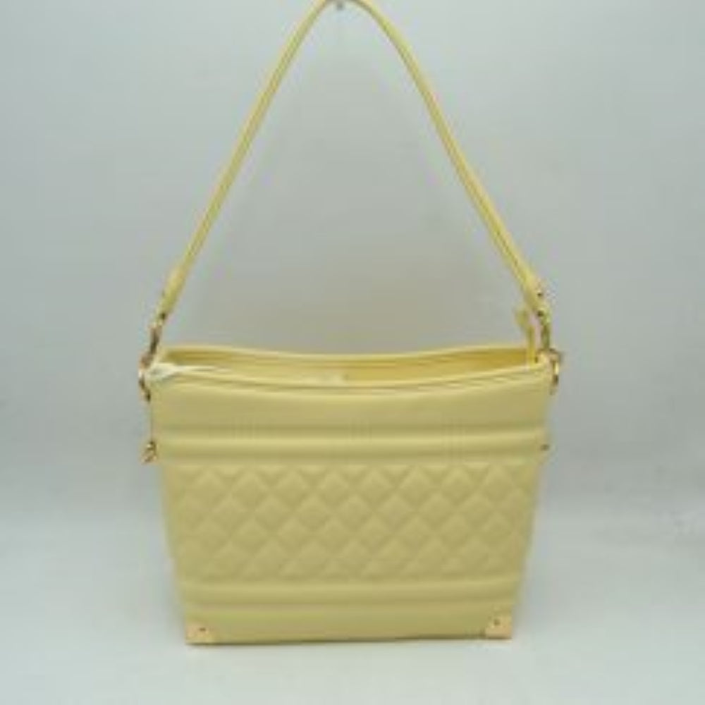 Yellow This everyday shoulder bag features a structured silhouette highlighted by a quilted diamond pattern across the lower midsection and horizontal stitched ridges. Designed for practical daily use, it is equipped with a single flat shoulder strap secured to the sides by hardware attachments.