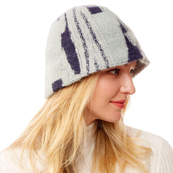 Navy Abstract Patterned Soft Fabric Bucket Hat. Show your trendy side with this chic animal print hat. Have fun and look Stylish. Great for covering up when you are having a bad hair day, perfect for protecting you from the sun, rain, wind, snow, beach, pool, camping or any outdoor activities.