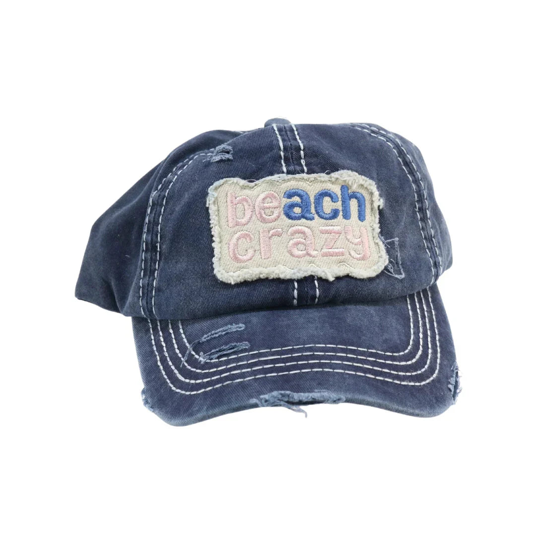 Beach Crazy Embroidered High Ponytail CC Ball Cap combines style and functionality, featuring an embroidered design that adds a distinctive touch. Its high ponytail opening ensures comfort and convenience for those with longer hair, making it ideal for outdoor activities. Crafted for durability and a secure fit, this cap offers both sun protection and a fashionable accessory for beach days or casual outings. 