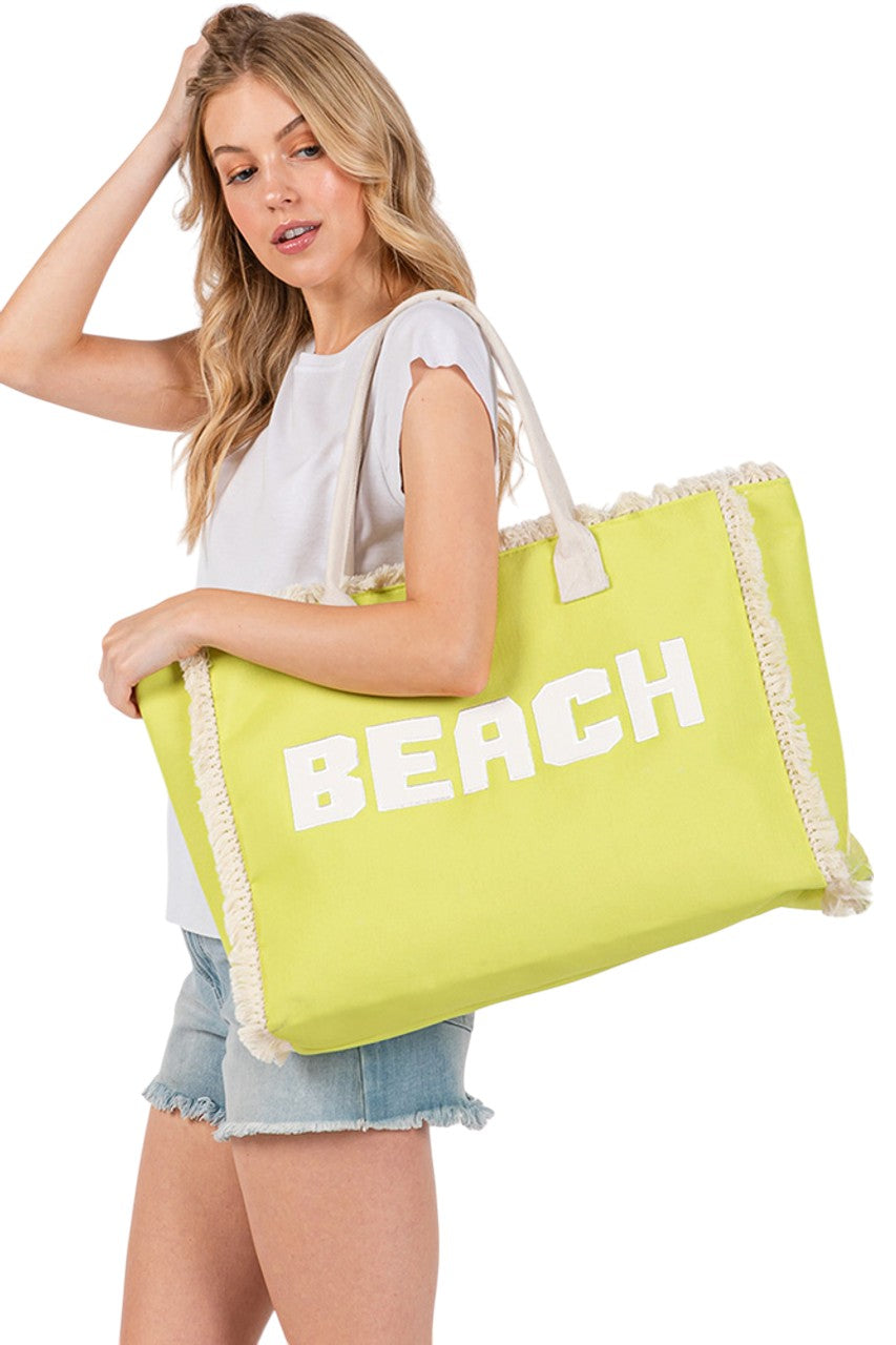 NeonYellow BEACH Embroidered Letter Fringe Summer Tote Bag combines style and practicality for your warm-weather outings. Crafted with durable materials, it features detailed embroidered lettering and playful fringe accents that enhance its summery appeal. Spacious enough to carry essentials, this tote is perfect for beach days or casual errands, offering both functionality and a distinctive, expert-crafted design. 