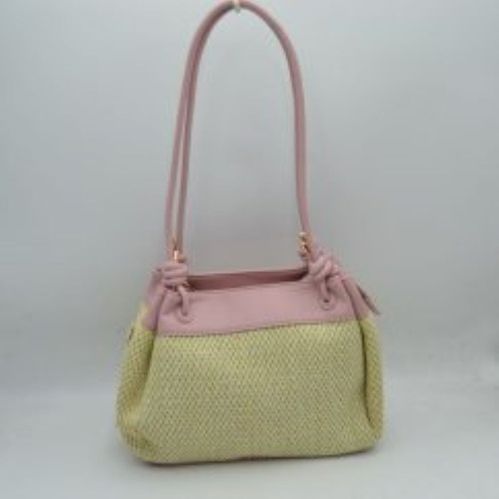 Blush pink Embrace a relaxed yet sophisticated aesthetic with this beautifully textured shoulder bag. The design prominently features a classic woven mesh panel across the main body, paired seamlessly with smooth trim along the upper edge and base. Dual slender shoulder straps attach to the bag with elegant, integrated knot details at the base, offering a comfortable drop for easy over-the-shoulder carrying. 