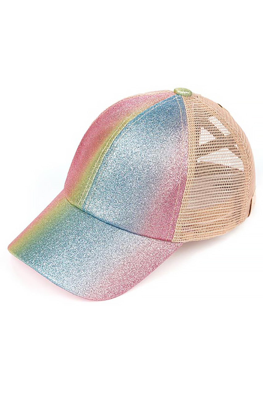 Pink Multi C.C Kids Ombre Glitter Criss-Cross Ponycap combines playful style with practical comfort. Featuring a shimmering ombre glitter design and a unique criss-cross pattern, this ponycap adds a touch of sparkle to any child's outfit while securely holding hair in place. Crafted for durability and ease of wear, it’s perfect for active kids who want both function and flair. 