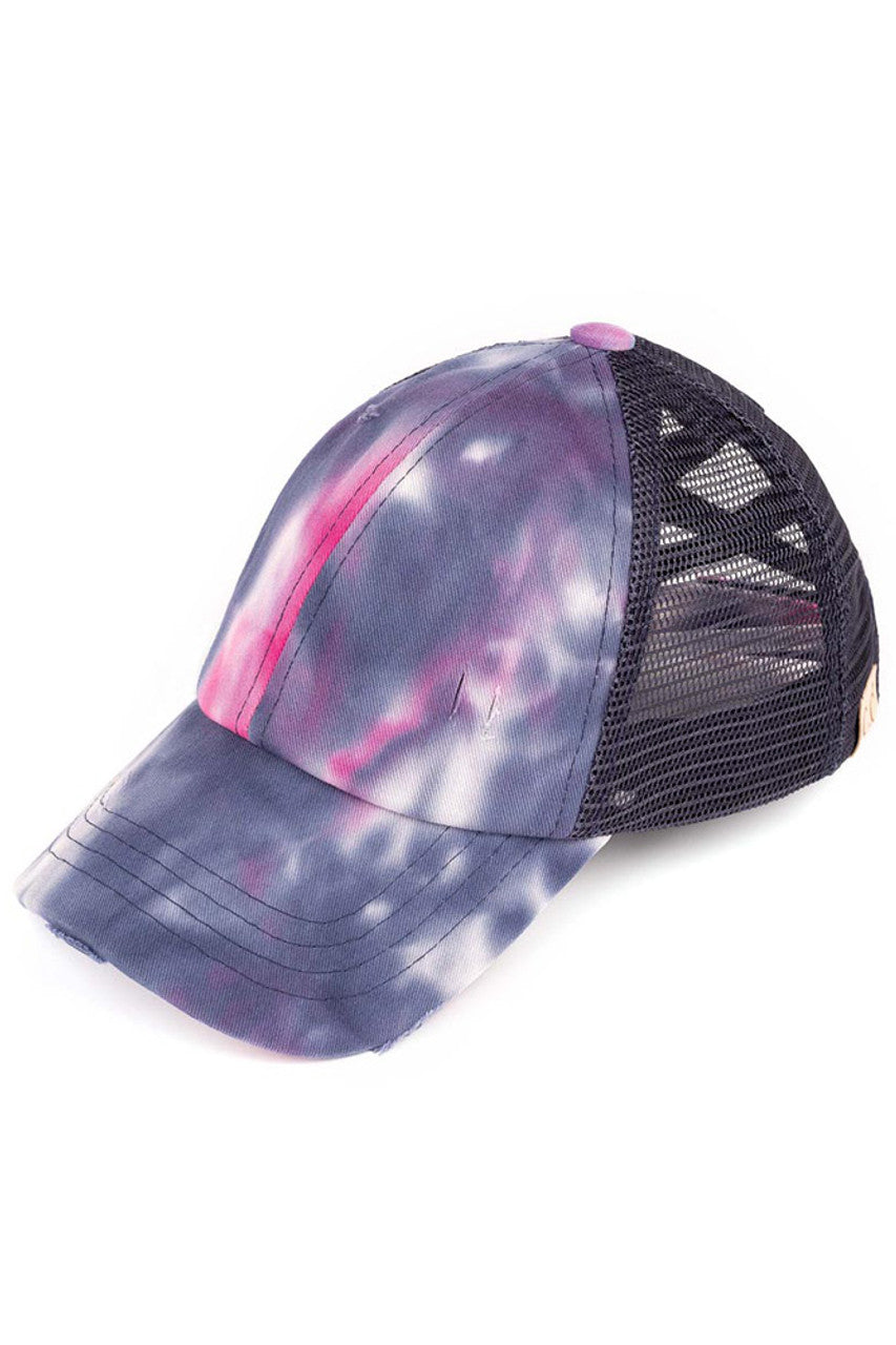 Navy C.C Kids Tie Dye Criss-Cross Ponycap combines playful tie-dye patterns with a practical criss-cross design, ensuring a secure and comfortable fit for active children. Crafted for durability and style, this ponytail keeps hair neatly in place while adding a vibrant touch to any outfit. Ideal for everyday wear, it offers both function and fashion for young, energetic lifestyles.