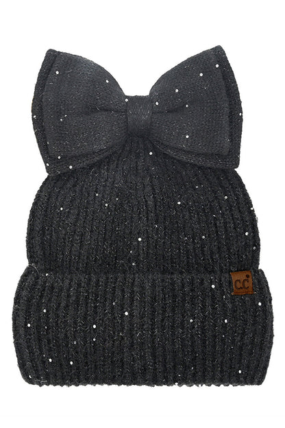 Black C.C Messy Bun Bow Beanie with Sequins Winter Hat combines functionality with sophisticated style. The specialized opening accommodates ponytails or messy buns, while the sequin embellishments add a touch of glamour. Crafted from premium thermal materials, this winter hat delivers optimal insulation without sacrificing aesthetics. The distinctive bow detail elevates this practical cold-weather essential into a fashion statement piece.