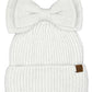 White C.C Messy Bun Bow Beanie with Sequins Winter Hat combines functionality with sophisticated style. The specialized opening accommodates ponytails or messy buns, while the sequin embellishments add a touch of glamour. Crafted from premium thermal materials, this winter hat delivers optimal insulation without sacrificing aesthetics. The distinctive bow detail elevates this practical cold-weather essential into a fashion statement piece.