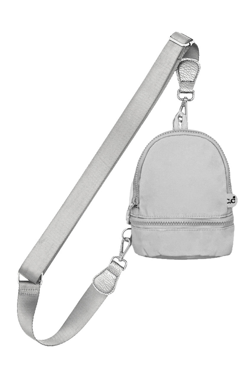 Light_Gray C.C Mini Solid Sling Backpack offers a compact yet functional design, perfect for hands-free convenience. Crafted with durable materials, it ensures long-lasting use while providing secure storage for essentials. Its adjustable strap allows for a comfortable fit, making it ideal for daily errands or travel. This sleek backpack combines practicality with style, delivering expert-level utility in a minimalist package. 