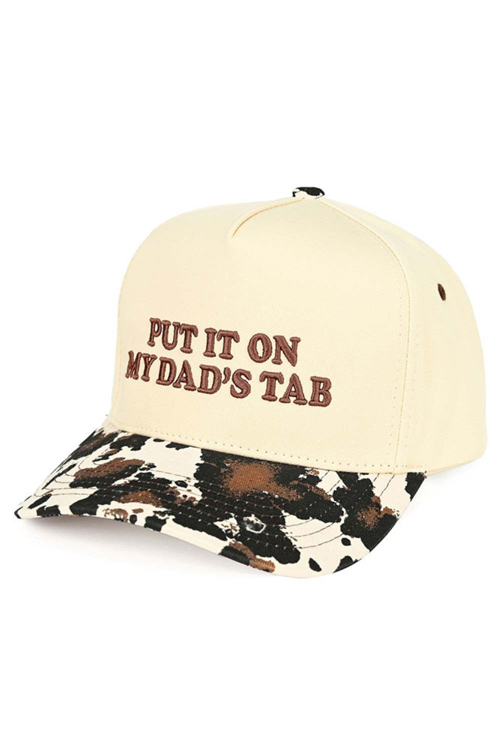 Cow C.C PUT IT ON MY DAD'S TAB Letter Trucker Hat executed with high-precision embroidery technology and engineered using a composite framework featuring a stabilized front panel for enhanced rigidity and strategically placed mesh zones for superior ventilation. The calibrated snapback system offers multi-point adjustability, allowing for a tailored fit. Advanced stitching techniques at high-stress areas ensure long-term structural durability. The pre-curved brim is designed to retain its shape consistently