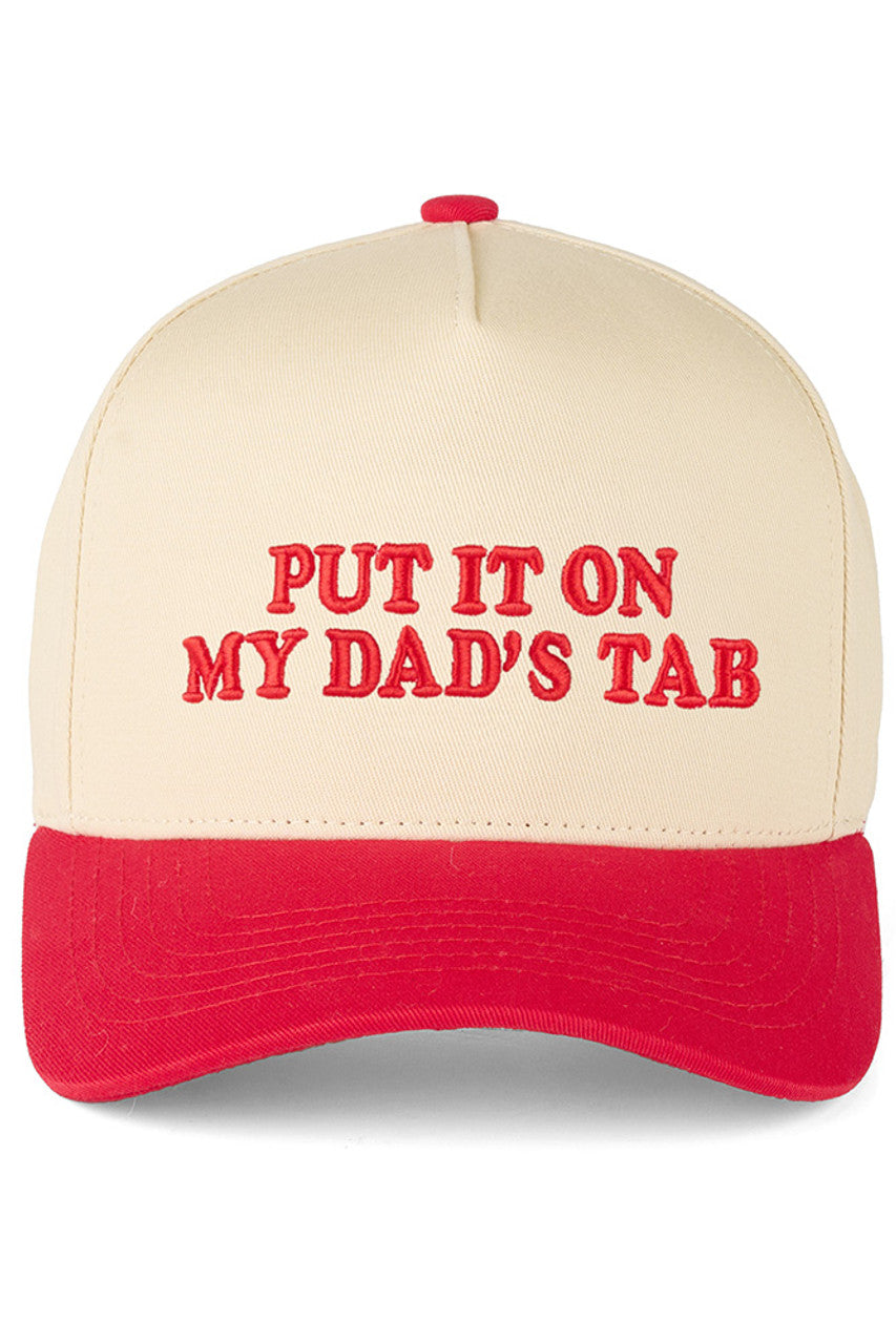Red C.C PUT IT ON MY DAD'S TAB Letter Trucker Hat executed with high-precision embroidery technology and engineered using a composite framework featuring a stabilized front panel for enhanced rigidity and strategically placed mesh zones for superior ventilation. The calibrated snapback system offers multi-point adjustability, allowing for a tailored fit. Advanced stitching techniques at high-stress areas ensure long-term structural durability. The pre-curved brim is designed to retain its shape consistently