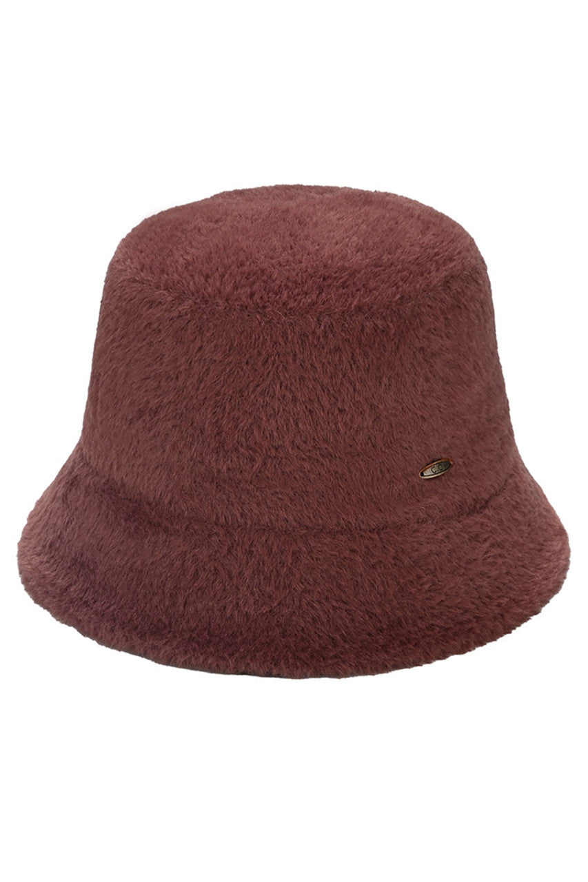 Chocolate C.C Solid Short Hair Faux Fur Winter Bucket Hat combines premium insulation with sophisticated style. The short-hair faux fur construction delivers exceptional warmth while maintaining a refined aesthetic. Expertly designed with a classic bucket silhouette, this hat provides optimal coverage during cold weather conditions while elevating your winter wardrobe with its luxurious texture and timeless appeal. 