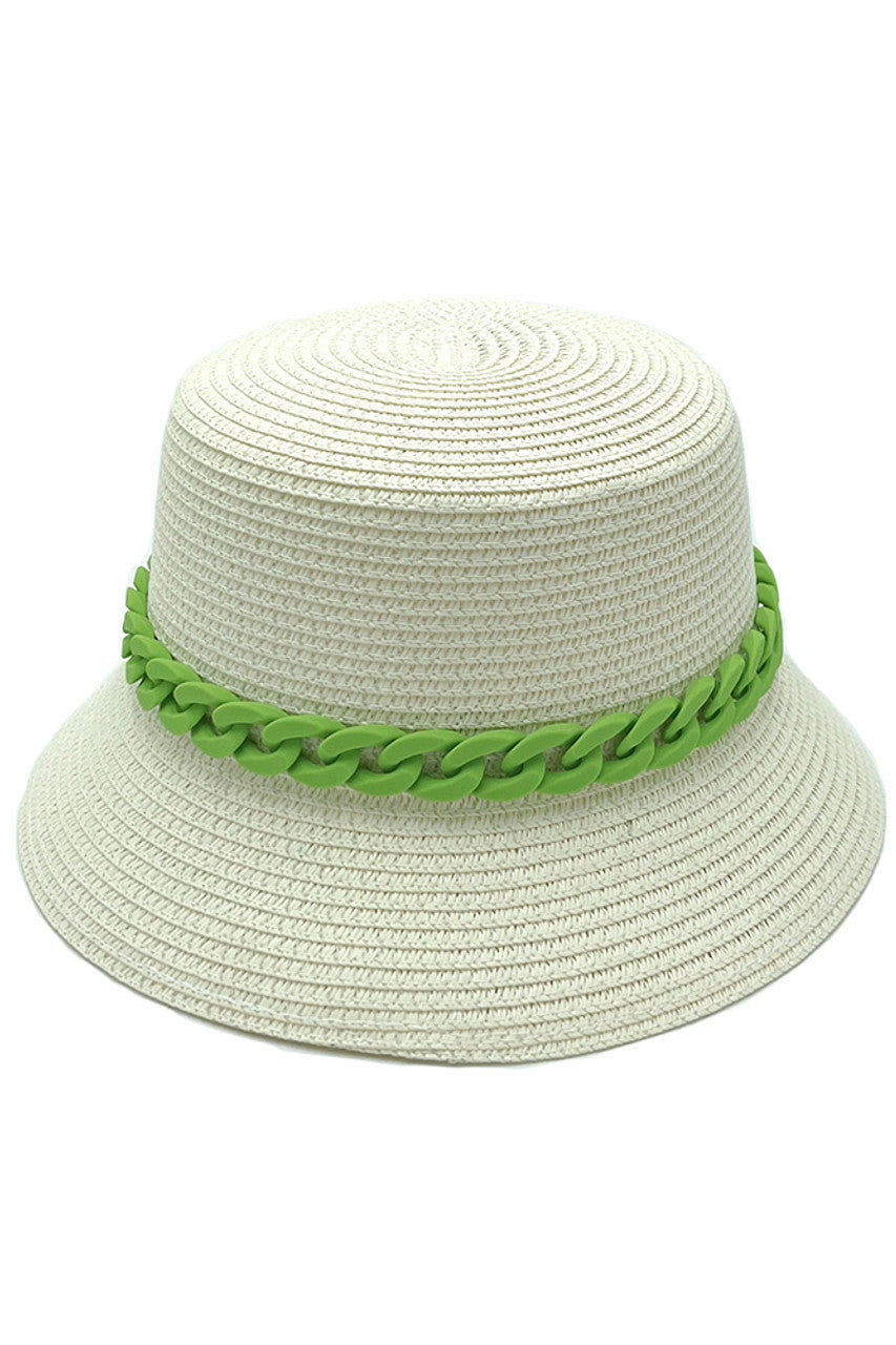 White CHAIN BAND STRAW BUCKET HAT features an integrated chain band detail that creates a sophisticated tension between natural and metallic elements. The specialized weave density provides UPF protection while maintaining optimal breathability through strategically placed ventilation points. Its ergonomically designed interior ensures a consistent fit across head sizes, while the calculated brim curvature delivers maximum facial coverage without distorting peripheral vision—an exemplary balance of technica