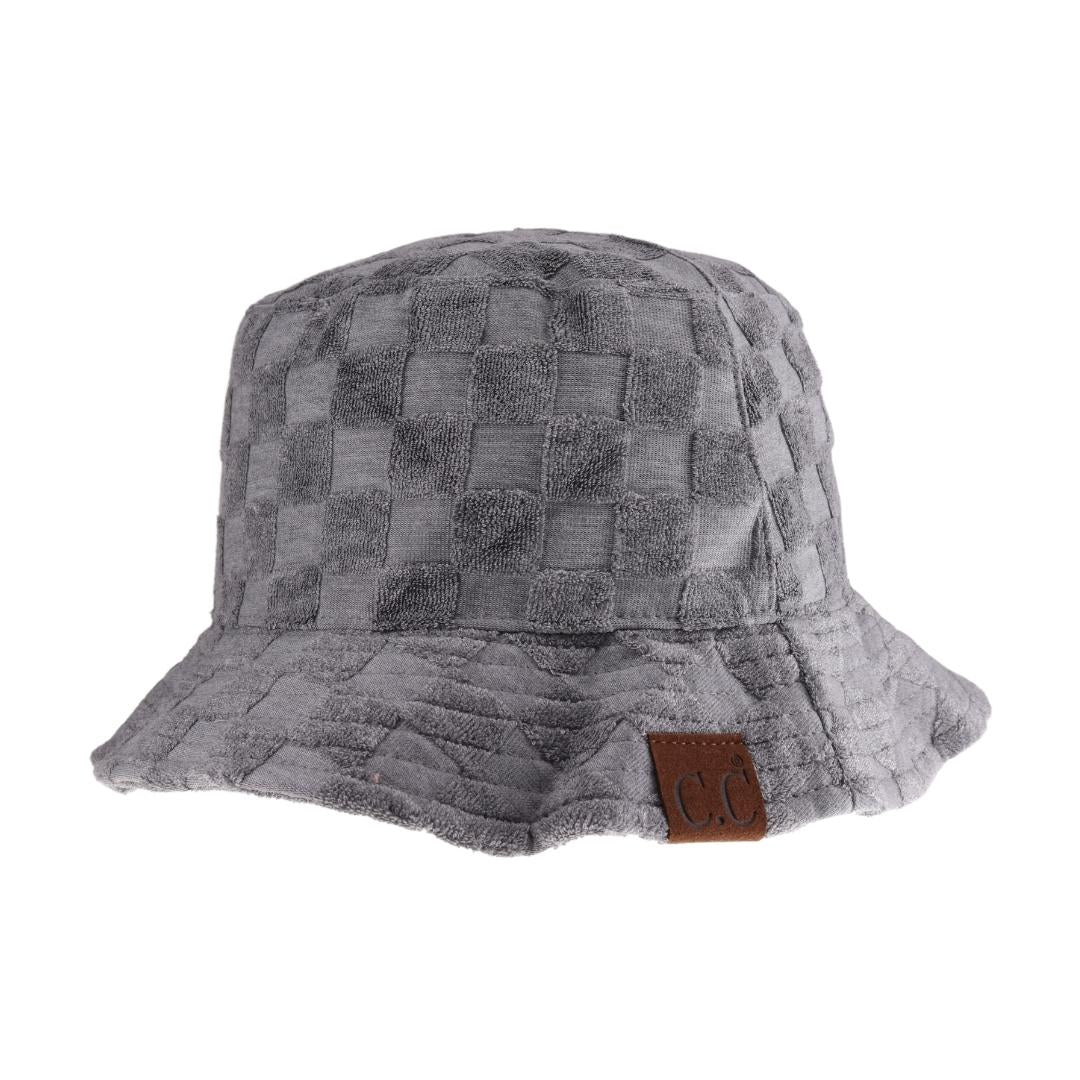 Grey Checkered Pattern Terry Cloth C.C Bucket Hat combines classic style with exceptional comfort. Crafted from soft terry cloth, this hat offers a lightweight, breathable fit ideal for all-day wear. Its distinctive checkered design adds a timeless, versatile touch, making it suitable for both casual outings and stylish ensembles. Durable and easy to care for, this bucket hat is a practical accessory that enhances your wardrobe with expert-level fashion and function. 