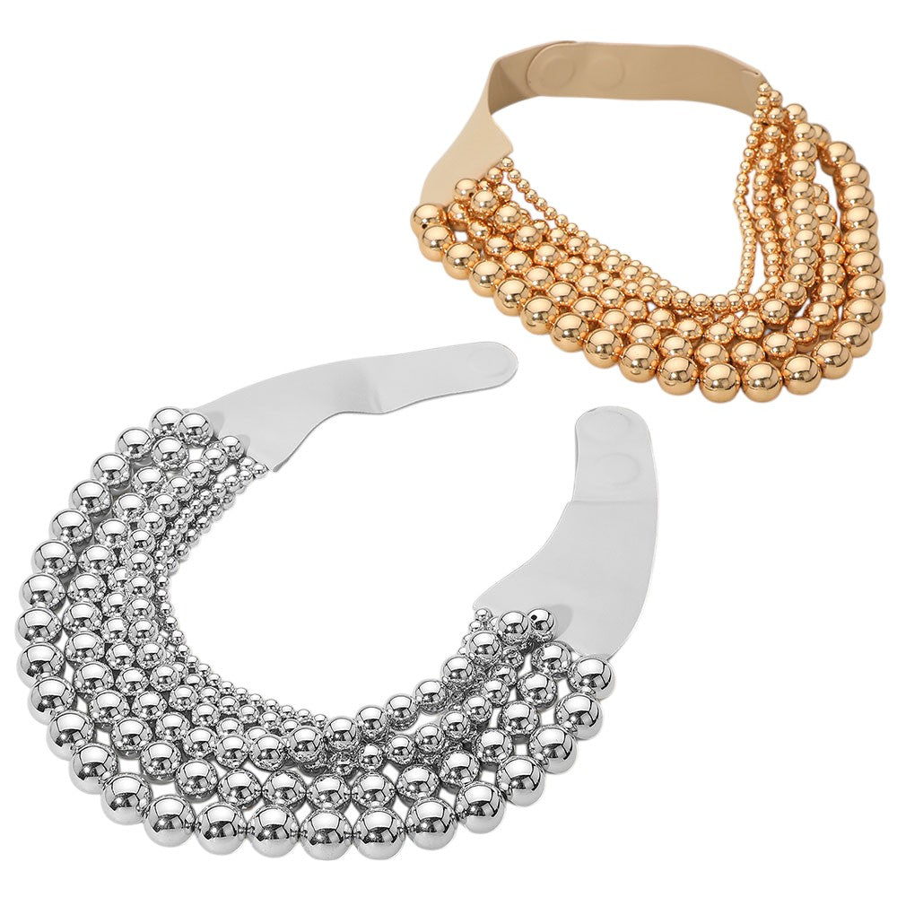 Chunky Metal Ball Beaded Multi-Layered Faux Leather Magnetic Necklace combines bold design with functional elegance. Crafted with layered faux leather strands accented by substantial metal ball beads, it delivers a textured, contemporary look. The magnetic clasp provides secure, easy fastening, enhancing wearability without compromising style. Ideal for professionals seeking a statement accessory that balances durability and modern sophistication. 