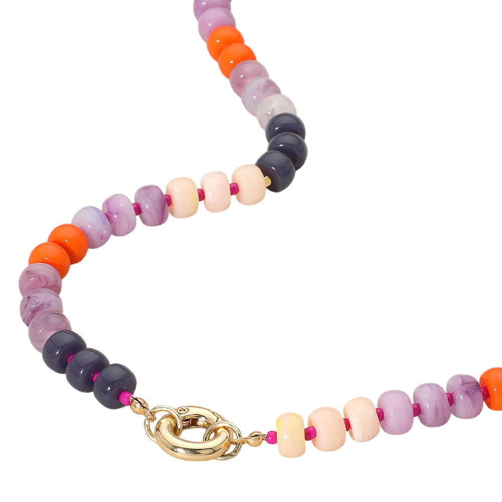Fuchsia Clasp Accent Disc Beaded Necklace showcases meticulous craftsmanship with its combination of smooth beads and precisely engraved disc accents. Designed for durability and style, its secure clasp provides ease of use while maintaining a polished appearance. This necklace is a versatile accessory that complements both formal and casual ensembles, offering a sophisticated detail that enhances your overall look with expert finesse.