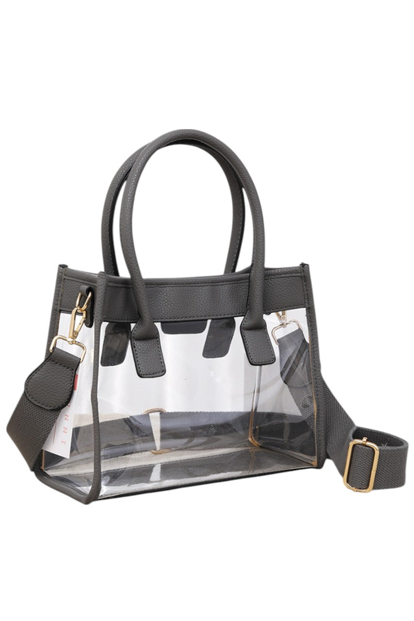 Color Trim Clear Hand Bag combines modern transparency with vibrant accents, offering a stylish yet practical accessory. Its clear design allows easy visibility of contents, while the colorful trim adds a fashionable touch. Lightweight and spacious, it’s ideal for daily use or events requiring quick access to essentials without sacrificing style. Durable materials ensure long-lasting wear, making it a smart choice for those who value both function and trend. 