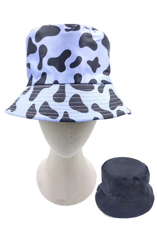 Blue Cow Print Reversible Bucket Hat features a precisely rendered cow print pattern with carefully calculated spot distribution for maximum visual definition. Constructed using advanced textile composites that deliver exceptional UV protection while maintaining optimal thermal regulation properties. Reinforced seam architecture ensures dimensional stability throughout repeated wear cycles, while the structurally engineered brim provides consistent shade coverage without compromising integrity. 