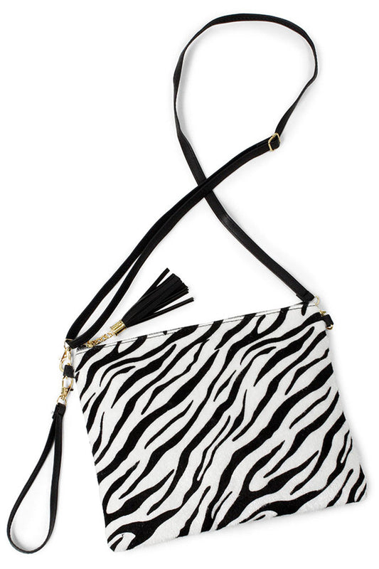 Crossbody Clutch offers a sleek, hands-free design ideal for on-the-go convenience. Crafted for durability and style, it features a secure closure and an adjustable strap to ensure a comfortable fit. Perfect for carrying essentials with ease, it combines practicality with a refined aesthetic suitable for both casual and formal occasions.