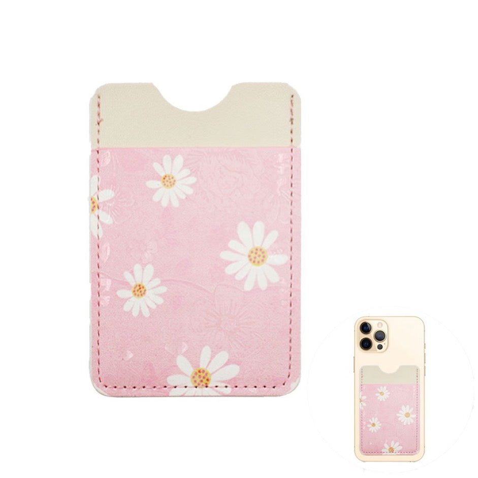 Pink Daisy Flower Patterned Faux Leather Adhesive Card Holder For Phone; be an ultimate fashionista when carrying a small pouch for your money or credit cards on the back of your phone. Makes shopping super easy without having to lug around huge purse! Perfect for grab & go errands, keep keys handy. Cute & Functional Gift