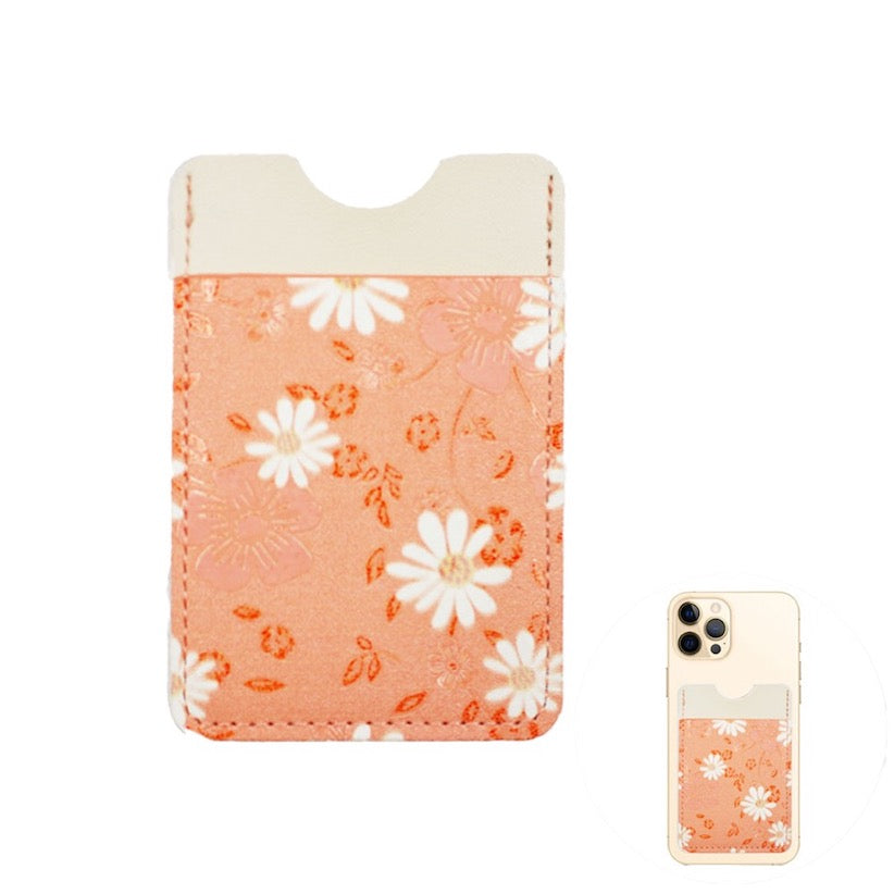 Orange Daisy Flower Patterned Faux Leather Adhesive Card Holder For Phone; be an ultimate fashionista when carrying a small pouch for your money or credit cards on the back of your phone. Makes shopping super easy without having to lug around huge purse! Perfect for grab & go errands, keep keys handy. Cute & Functional Gift