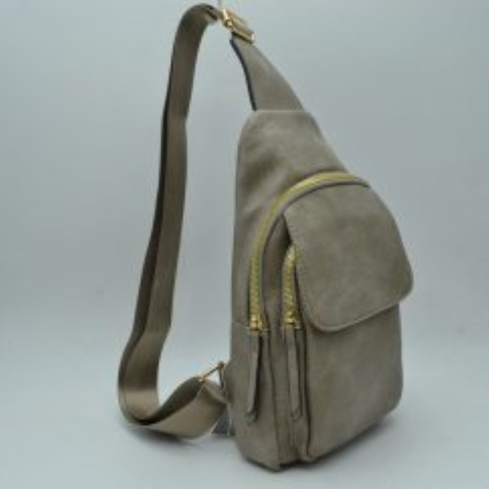 Dark gray Streamline your daily commute or weekend adventures with this sleek and functional sling backpack. Designed with a contemporary teardrop silhouette, this multi-compartment pack offers efficient organization without sacrificing style. The exterior features a subtly crinkled, textured finish that delivers a rugged yet sophisticated look. Multiple zippered compartments are accented with heavy-duty, polished metallic zippers